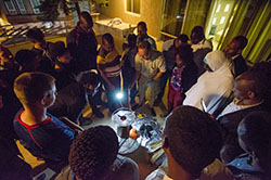 Prof. Snyder demonstrating the operation of a thermoelectric wood burning stove that provides electrical power and heat